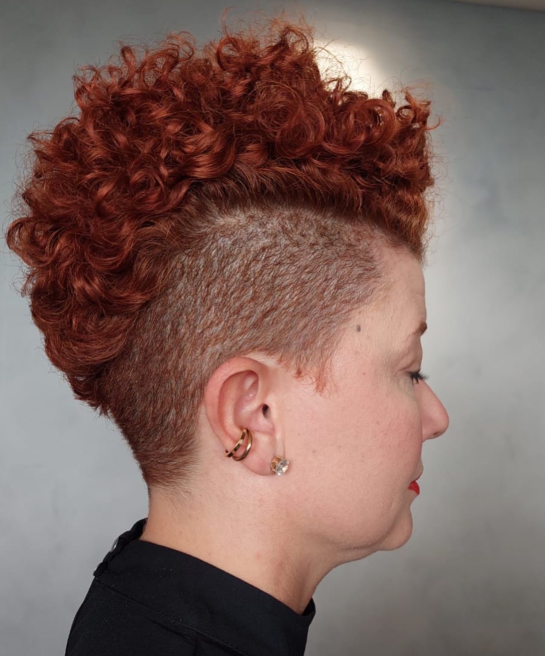 Women’s High Top Curly Undercut Hairstyle