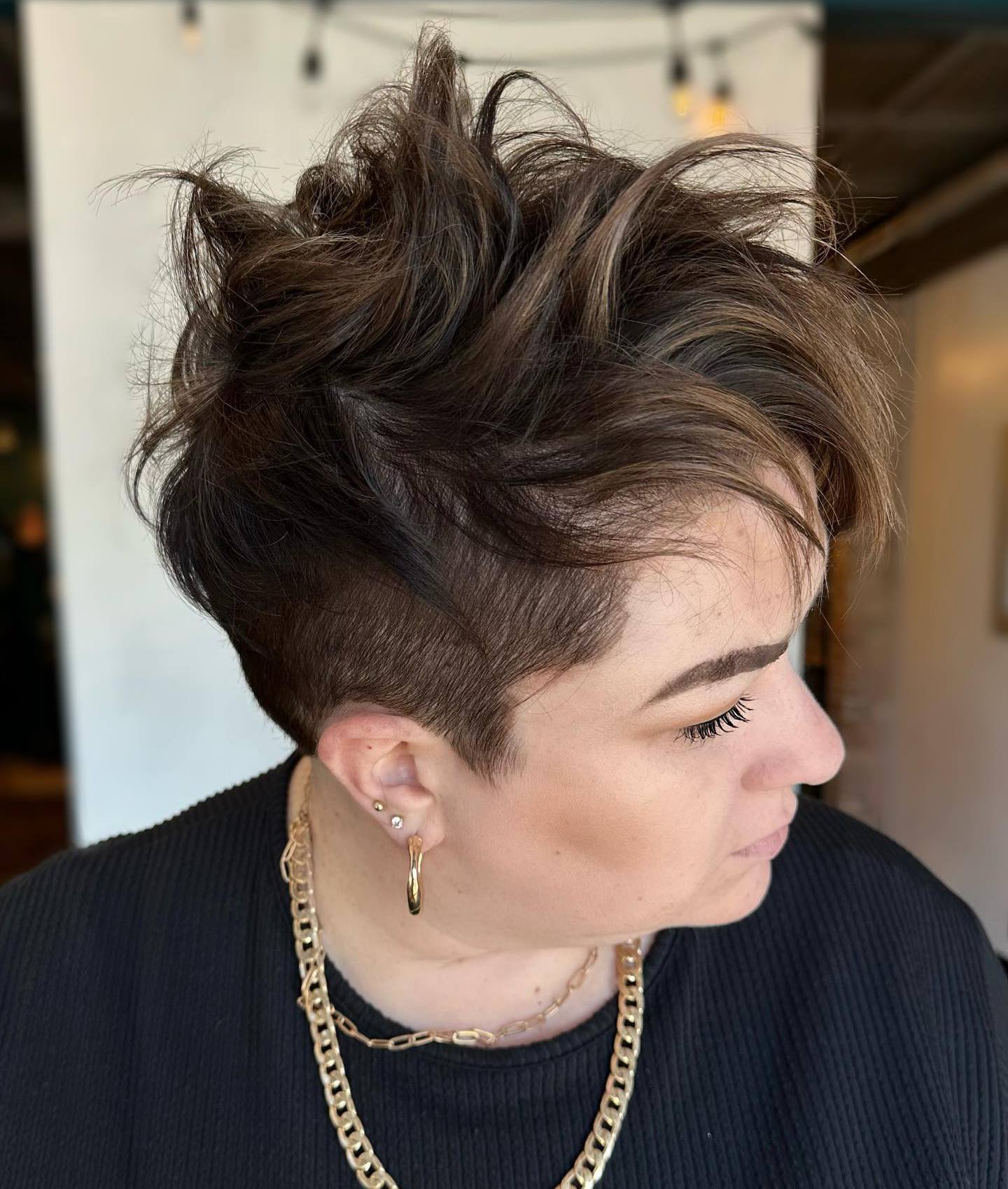 Messy Long Top Short Sides Hairstyle for Women